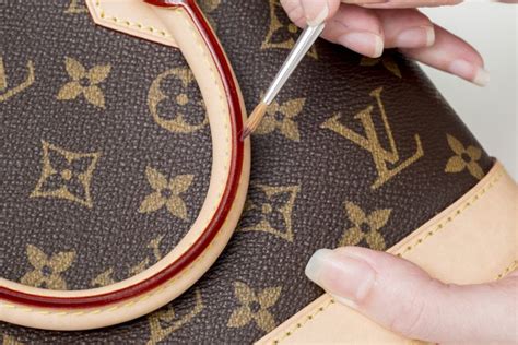 louis vuitton duffle bag repair cost|louis vuitton handbag restoration.